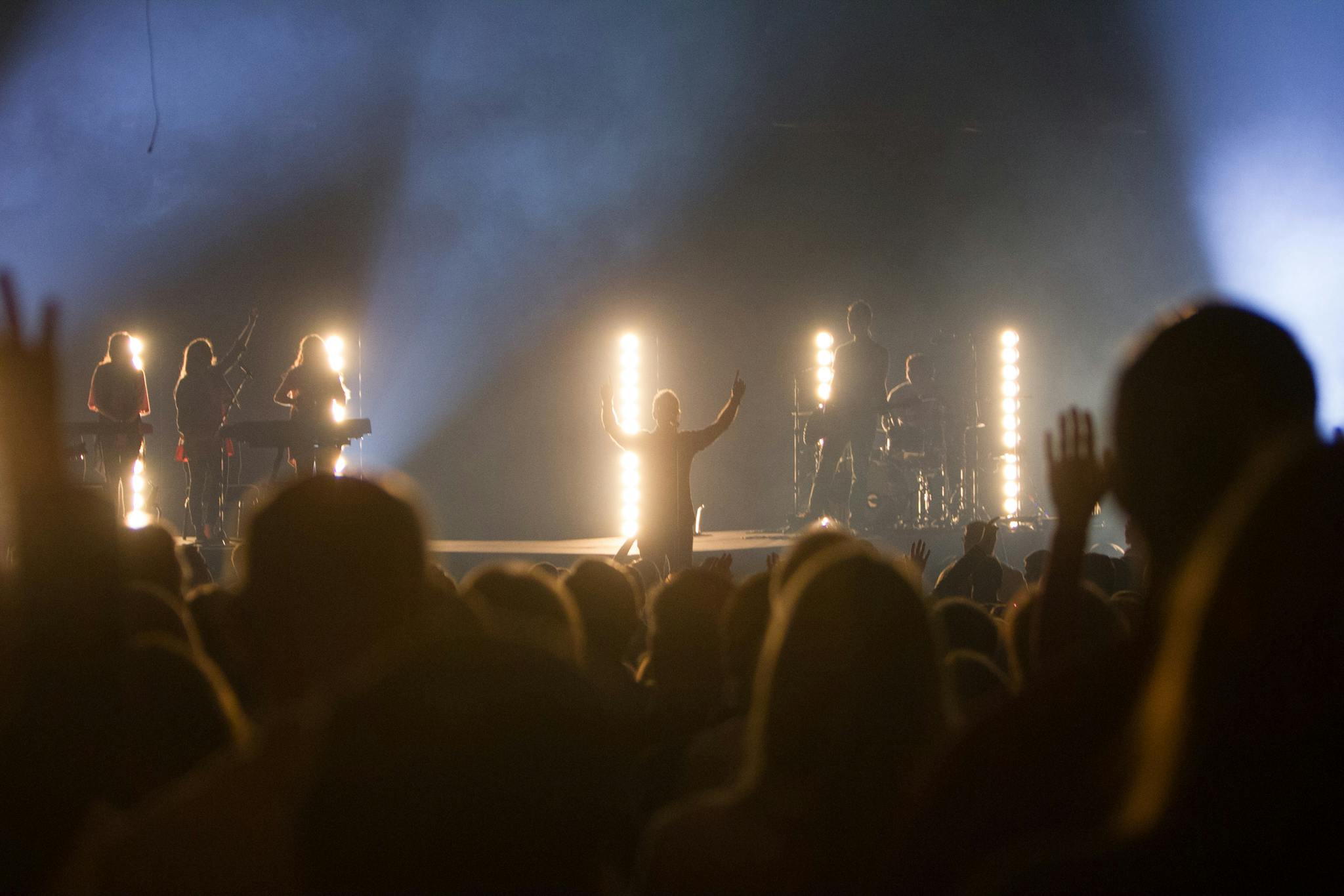 Never Run Out of Ideas: Top Tips for Generating Fresh Blog Topics Vibrant Live Music Concert With Silhouetted Band And Cheering Crowd Under Bright Stage Lights. 894566 2048x1366
